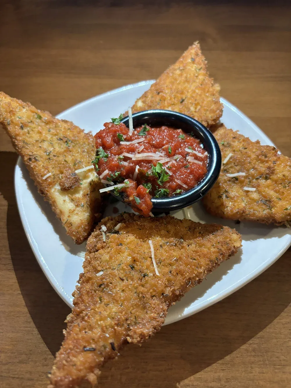 Crispy fried ravioli served with house marinara