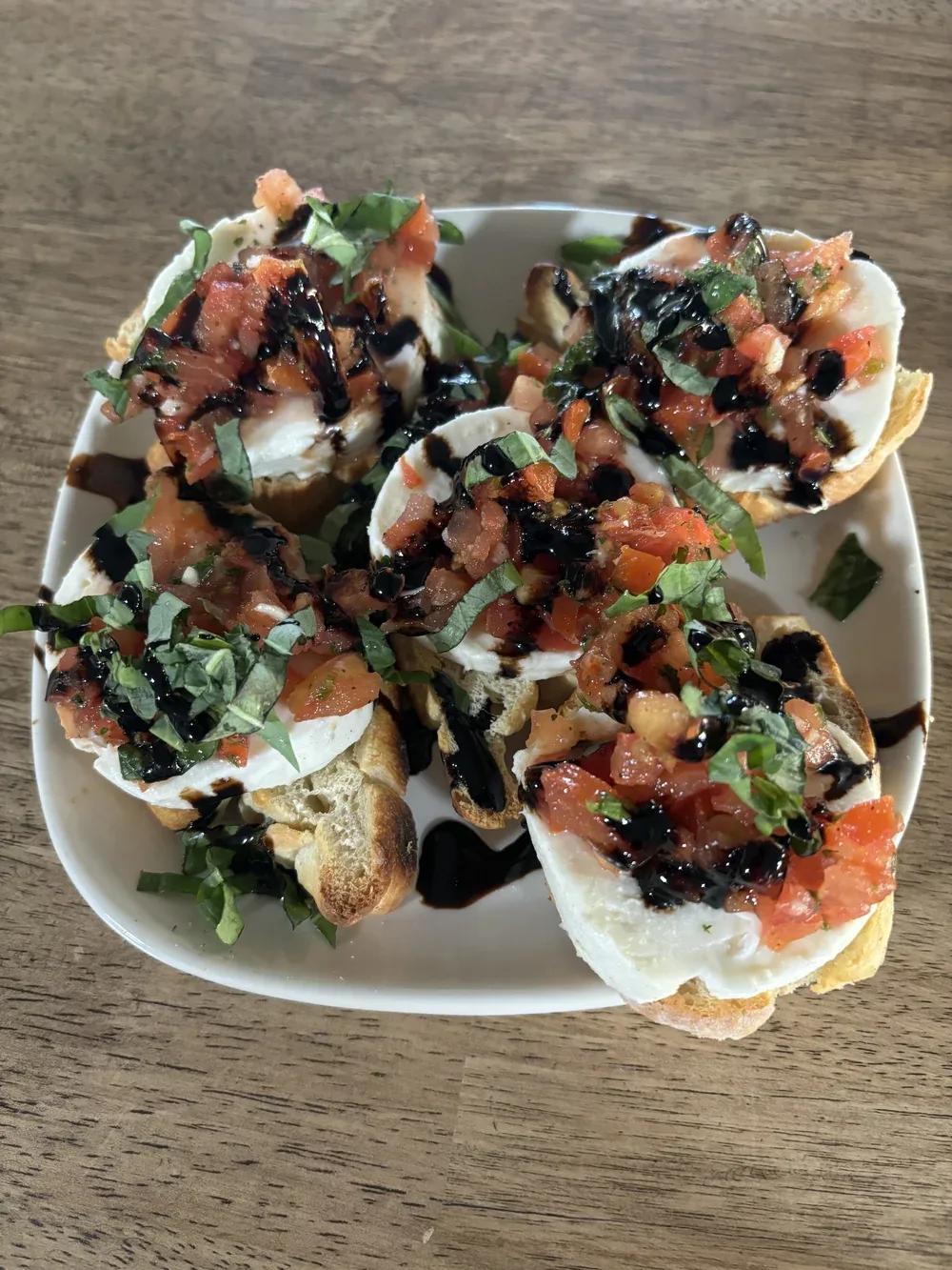 Bruschetta with tomato basil and mozzarella on toasted French bread at Castle Rock