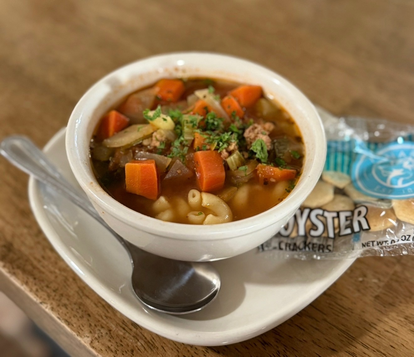 Homemade vegetable beef soup with macaroni, carrots and celery